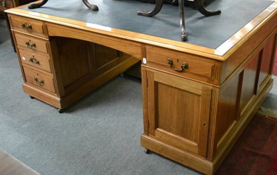 Lot 1318 - Early 20th century mahogany partner's desk, with brass locks stamped 'Hobbs & Co. London'