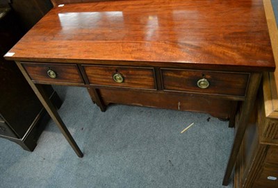 Lot 1326 - An early 19th century mahogany side table, rectangular top over three drawers, square tapered legs