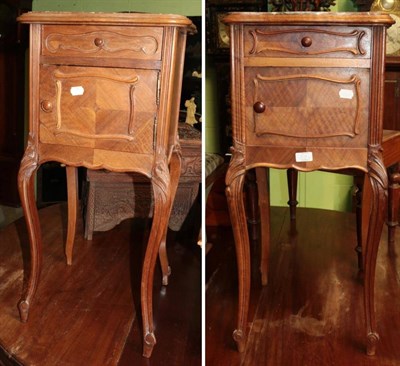 Lot 1339 - Pair of French walnut and marble top bedside cupboards