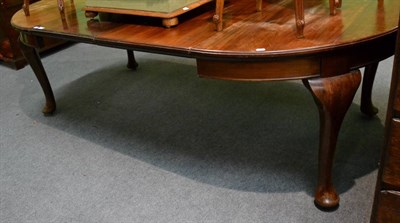 Lot 1340 - A late 19th century/early 20th mahogany wind-out dining table