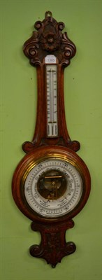 Lot 1365 - Late Victorian carved oak barometer