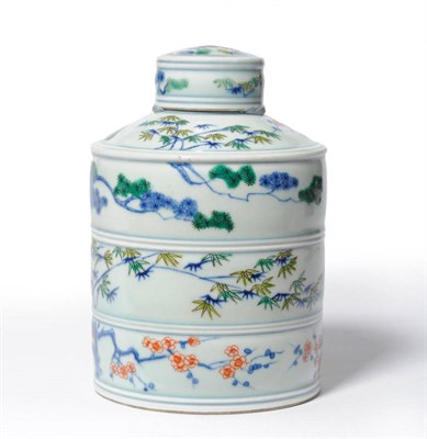 Lot 96 - A Chinese Porcelain Wucai Ribbed Cylindrical Jar and Cover, Qing Dynasty (1644-1911), with...
