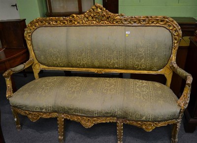 Lot 1369 - French style carved giltwood three seater sofa, 181cm wide