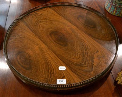 Lot 1371 - A large rosewood and brass galleried lazy Susan together with a reproduction plant stand in the...