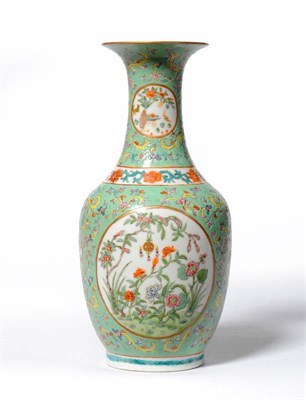 Lot 97 - A Chinese Porcelain Baluster Vase, with trumpet neck, painted in famille rose enamels with...