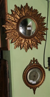 Lot 1387 - A gilt framed convex sunburst wall mirror by Gomme Furniture, Wycombe, and a gilt barometer stamped