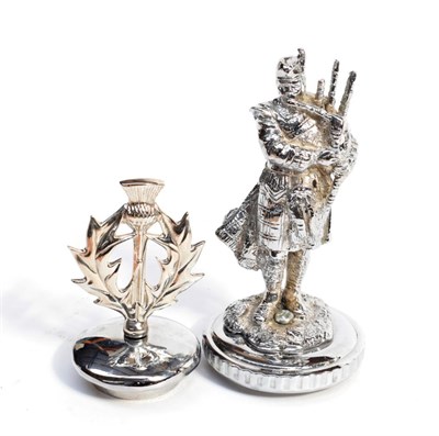 Lot 3040 - A Chrome on Brass Car Mascot, in the form of a Scotsman playing bagpipes and standing on a...