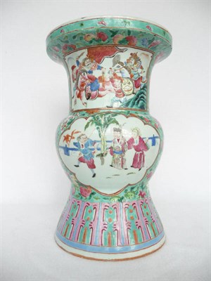 Lot 105 - A Chinese Porcelain Vase, 19th century, of baluster form with trumpet neck and flared base, painted