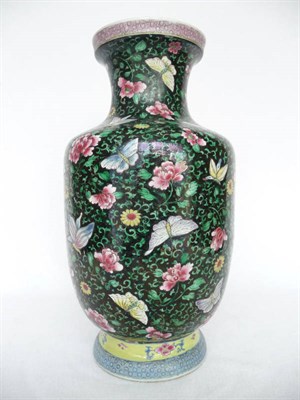 Lot 107 - A Chinese Porcelain Baluster Vase, 19th century, the flared neck painted in famille rose...