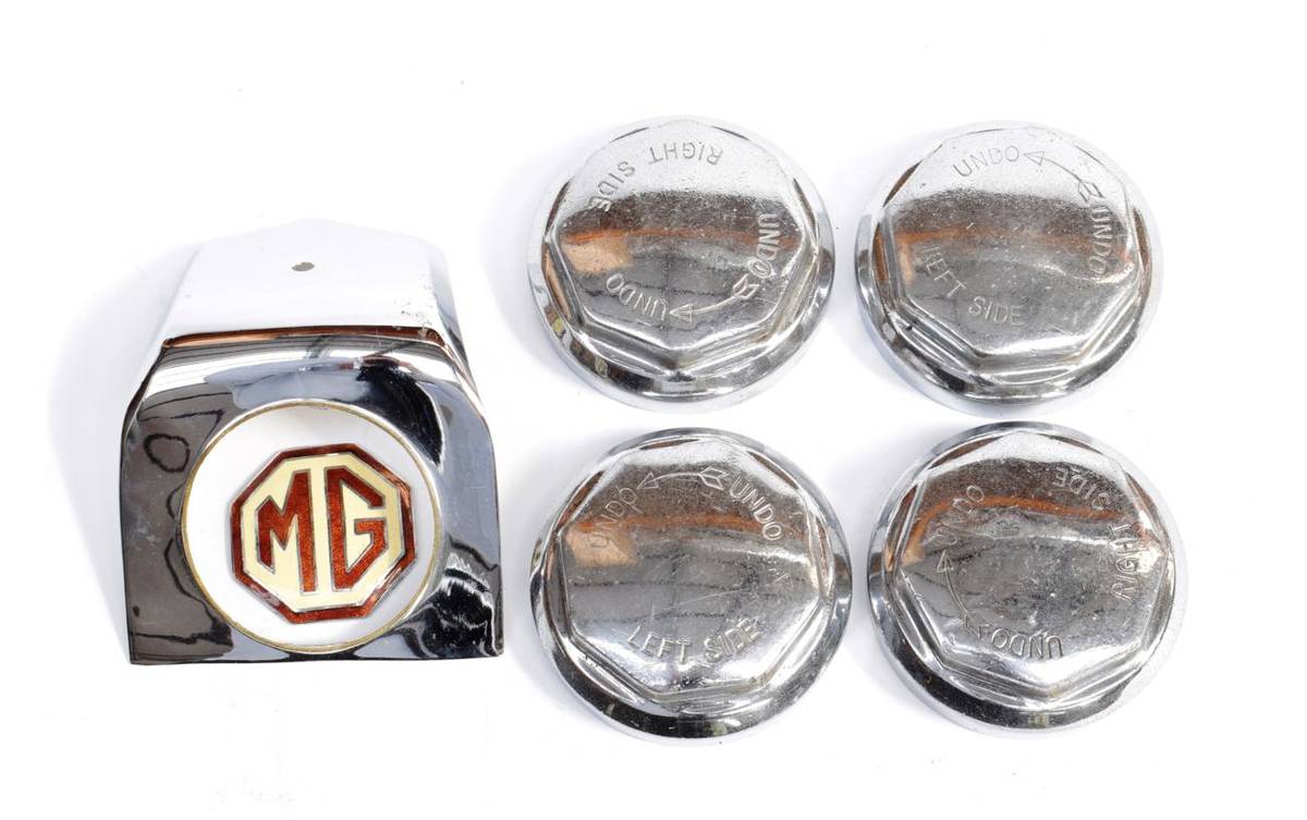 Lot 3093 - Four Chrome on Brass Wheel Hub Spinners; and A Chrome and Enamelled MG Badge