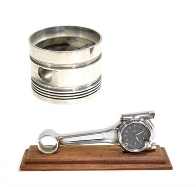 Lot 3099 - A Stainless Steel Spitfire Piston, 13.5cm diameter; and A Stainless Steel Connrod's Connecting Rod