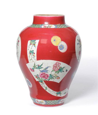 Lot 109 - A Chinese Porcelain Ruby Ground Baluster Vase, painted in famille rose enamels with peony, fruiting