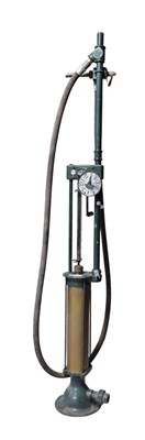 Lot 3115 - A Gilbert & Barker Self-Measuring Skeleton Petrol Pump, circa 1915, painted green, with rubber hose