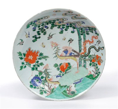 Lot 112 - A Chinese Porcelain Saucer Dish, Kangxi (1662-1722), painted in famille verte enamels with...