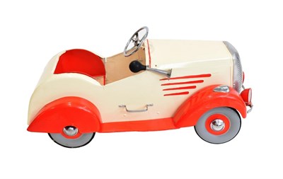 Lot 3221 - A 1930's Child's Pedal Car, repainted cream and red, with chromed three-spoke steering wheel,...