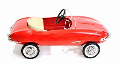 Lot 3222 - A Child's Triang Metal Pedal Car, in the form of a red Jaguar E-Type with number plate RBH1,...