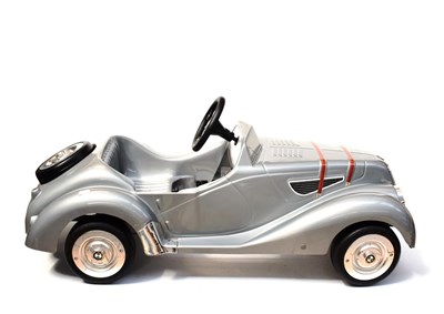Lot 3228 - A Child's Grey Plastic Pedal Car, modern, modelled as a 1930's BMW328, with three-spoke...