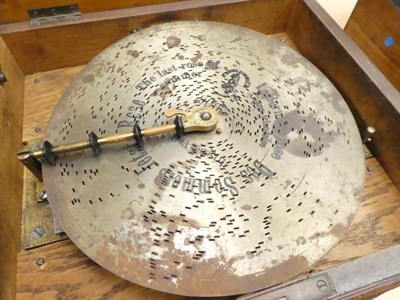 Lot 65 - Table Top Polyphon playing 11'' discs, with single piece comb in wooden case with floral...