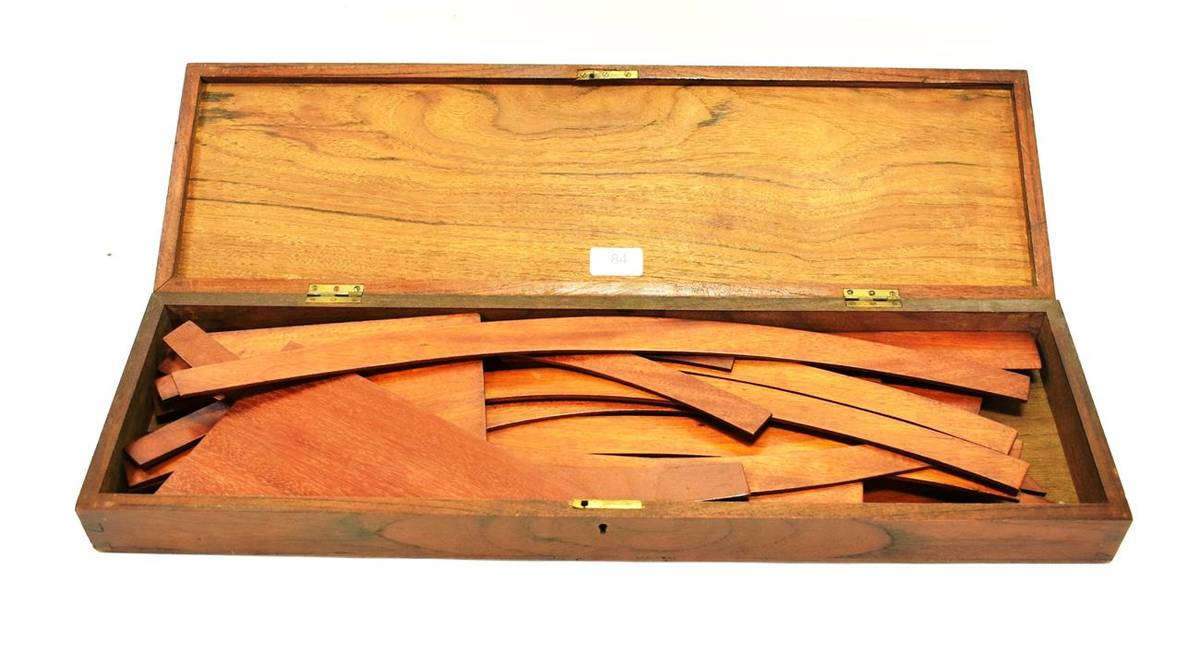 Lot 84 - Draftsmans Set Of Teak Curves And Set Squares no graduations or other labelling, in mahogany case