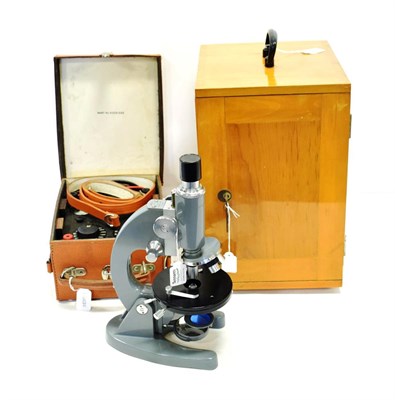 Lot 88 - Guangzhou Model L201 Microscope grey lacquer finish with three lens turret (cased) together...