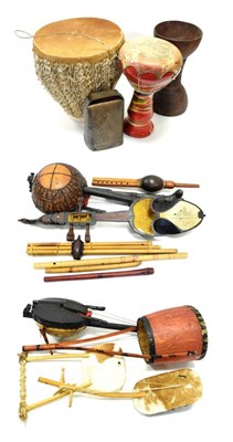 Lot 51 - Asian/African Instruments including various tuneable stringed instruments, two drums, one with...