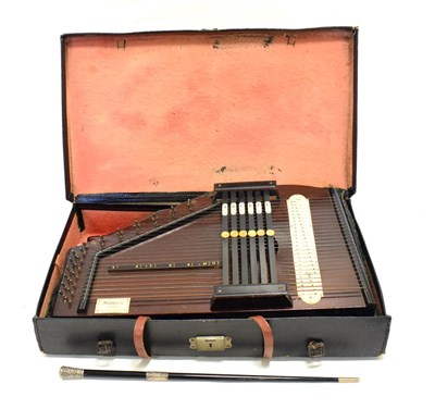 Lot 52 - Autoharp By Muller's 26 strings and six chord bars, cased with accessories including tuning...