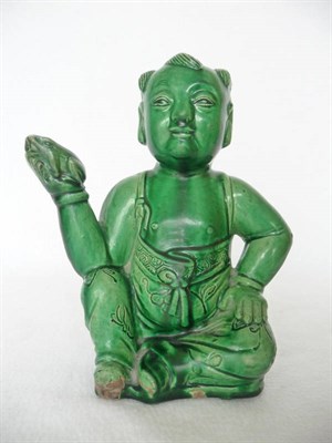 Lot 135 - A Chinese Green Glazed Figural Ewer, as a seated man holding a toad in his raised right hand,...