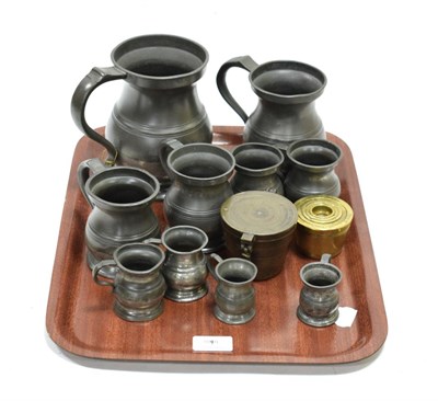 Lot 109 - Pewter Liquid Measures Quart stamped 'James Yates', Pint 'VR' and 'GR', two half pints, two...