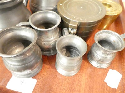 Lot 109 - Pewter Liquid Measures Quart stamped 'James Yates', Pint 'VR' and 'GR', two half pints, two...