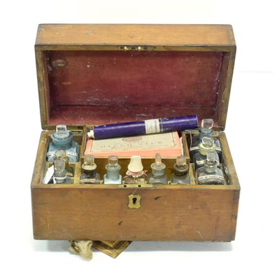 Lot 111 - Apothecary Chest with 12 bottles labelled 'Gibbs & Gurnell' with various contents, in simple wooden