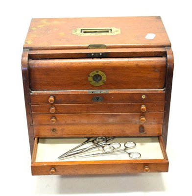 Lot 113 - Dentist Instruments Cabinet mahogany with six drawers and a top lockable section, containing...