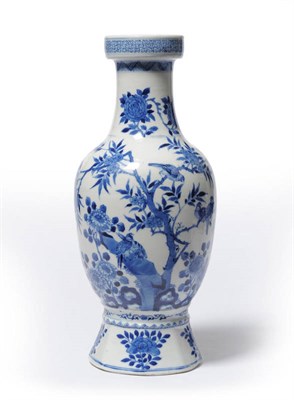 Lot 137 - A Chinese Ovoid Vase, 19th century, decorated in underglaze-blue with birds perched amongst...