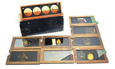 Lot 119 - Magic Lantern Slides eight wood framed examples (seven with moving slides) and eleven colour slides