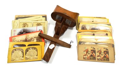 Lot 123 - The Perfectoscope Hand Held Stereo Viewer together with assorted slides including: Full Moon,...