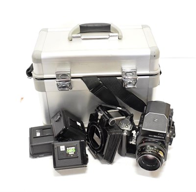 Lot 126 - Bronica ERTS Camera with Zenzanon MC f2.8 75mm lens, prism viewer and pistol grip, with film...