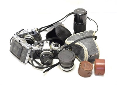 Lot 133 - Canon FTb Camera no.309282, with Canon FD f1.8, 50mm SC lens; Canon FD f5.6 100-200 SC lens;...