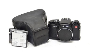 Lot 146 - Leica RE Camera Body Only no.1900738, with display box, leather case and two filters