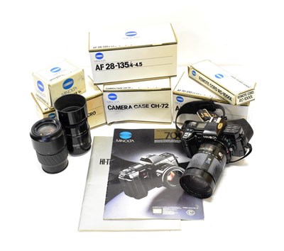Lot 155 - Minolta 7000 Camera with Minolta f4(22)-45 28-135mm lens; with two additional Minolta lenses:...
