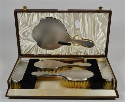 Lot 36 - A boxed five piece silver dressing table set