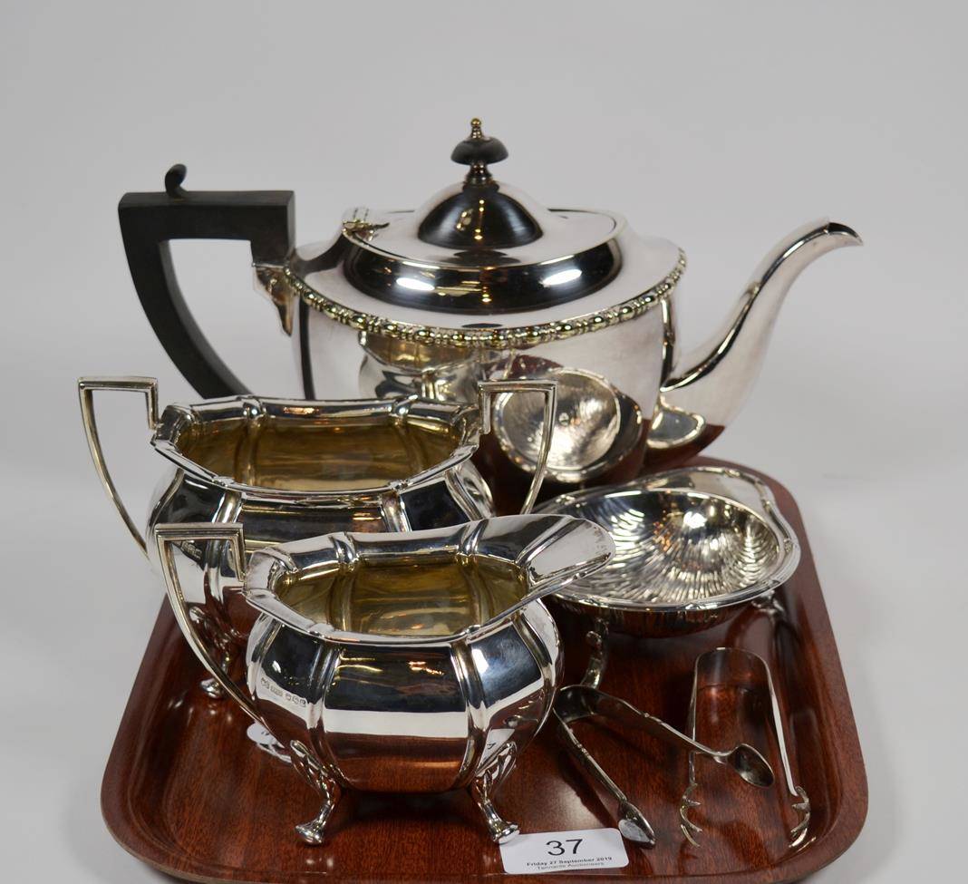 Lot 37 - An Edwardian silver sucrier and cream jug, J.D. & S Sheffield, 1910, with a EPNS teapot, dish...