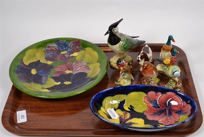 Lot 40 - Two Walter Moorcroft dishes and Beswick animals