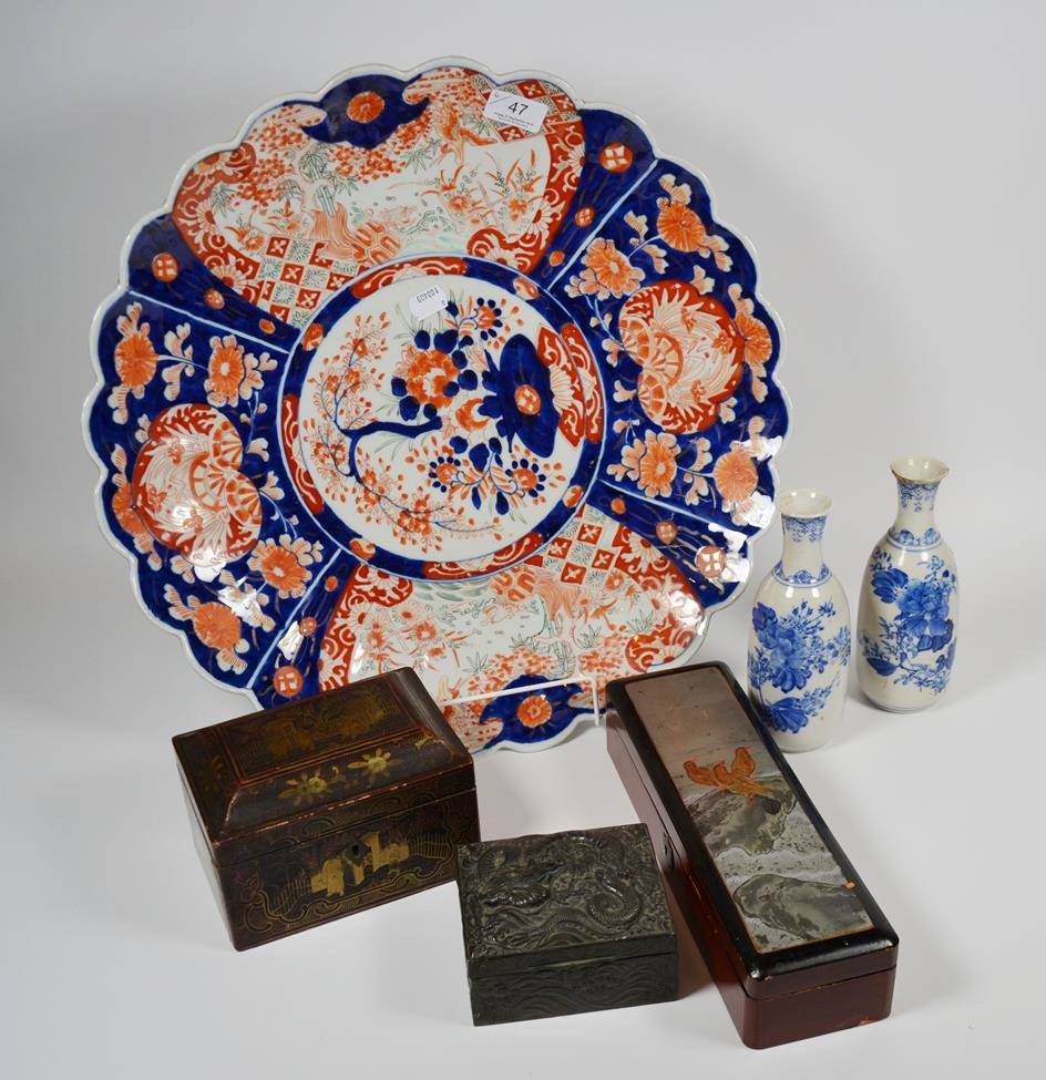 Lot 47 - A Japanese Imari charger, two blue and white vases, and three Oriental boxes