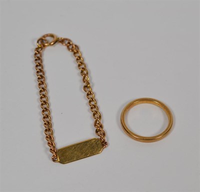Lot 60 - A small size identity bracelet, length 14cm; and a 9 carat gold band ring, finger size L