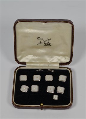 Lot 66 - A pair of cufflinks, four buttons and a stud, all stamped '9CT', in a case by Antrobus