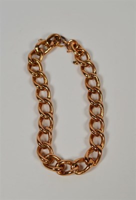Lot 75 - A rose coloured curb link bracelet, clasp stamped '375', length 22cm