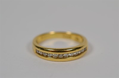 Lot 76 - An 18 carat gold diamond half hoop ring, finger size K