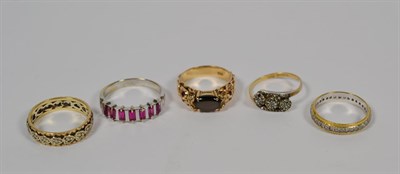 Lot 77 - A star sapphire ring, stamped '14K', finger size O; two 9 carat gold gem set rings, finger...