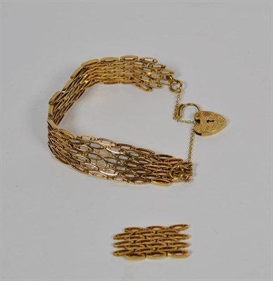 Lot 78 - A gate bracelet, stamped '375' with a 9 carat gold padlock clasp, length 19cm; together with...