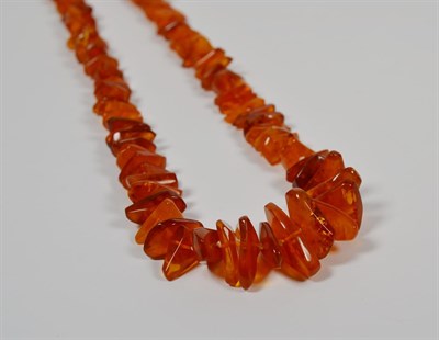 Lot 87 - An amber type necklace, length 80cm