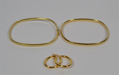 Lot 97 - Two bracelets stamped '375', and a pair of earrings stamped '375'
